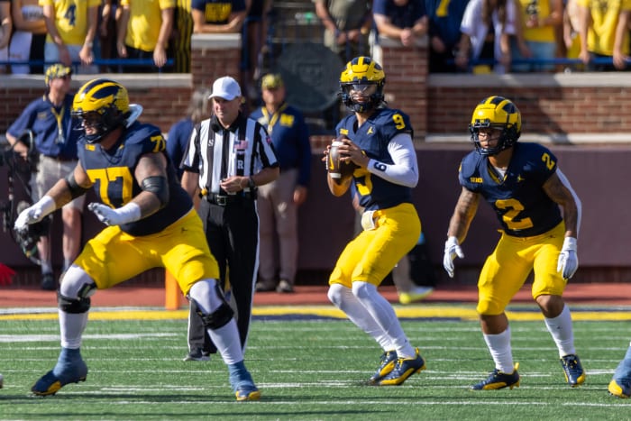 Sep 9, 2023; Ann Arbor, Michigan, USA; Michigan Wolverines quarterback J.J. McCarthy (9) looks down field against the UNLV Rebels during the first half at Michigan Stadium. Mandatory Credit: David Reginek-USA TODAY Sports